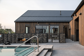 Bozeman apartment for rent - A modern house with a pool in the backyard.