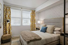 Meridian apartment for rent - a bedroom with a bed and two windows with curtains  at Seasons at Meridian, Meridian, ID