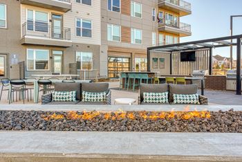 Outdoor lounge area with firepits