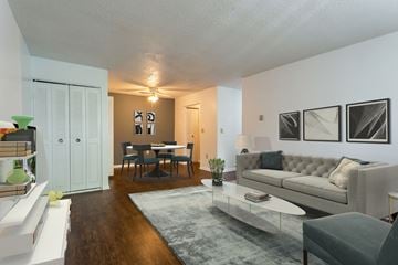 Watervliet apartment for rent - a living room and dining room with a couch and a table