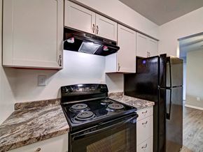 Watervliet apartment for rent - Updated Kitchen With Black Appliances at Highland Club Apartments, Watervliet, NY 12189