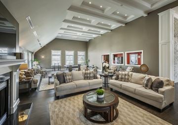 Latham apartment for rent - a living room with couches and chairs and a fireplace