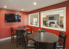 Latham apartment for rent - a dining room with a table and chairs and a large window