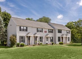 Gansevoort apartment for rent - a white house with a lawn in front of it