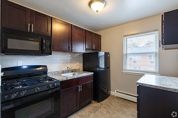 Contemporary remodeled open kitchens with energy-efficient appliances*