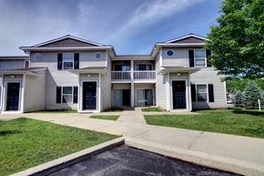 Cohoes apartment for rent - a white house with a sidewalk in front of it