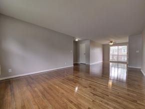 Menands apartment for rent - an empty living room with hardwood flooring and a window