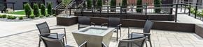 Chapel Hill apartment for rent - A patio with a table and chairs2 and a fountain.