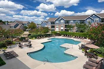 Pool with attached gas fire pit
