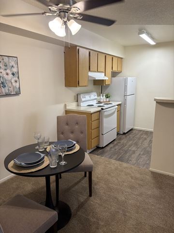Cave Creek apartment for rent - A small kitchen with a table set for two.