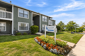Kansas City apartment for rent - A sign for Bluestar Crossing in front of a building.