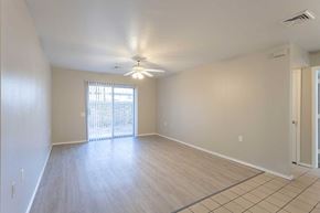 Las Cruces apartment for rent - an empty living room with a ceiling fan