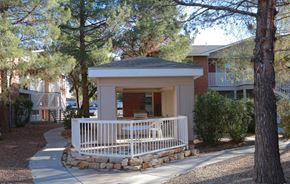Las Cruces apartment for rent - a small gazebo with a porch in front of a building