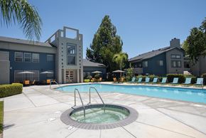 Roseville apartment for rent - A swimming pool with a hot tub at Autumn Oaks Apartments, Roseville, CA, 95678