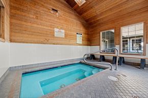 Portland apartment for rent - An indoor spa with a bench and a window at Clackamas Trails Apartments, Oregon, 97222