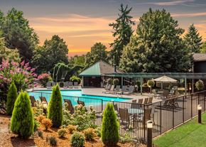 Beaverton apartment for rent - Seasonal pool exterior fence at sunset at King's Court Apartments, Beaverton, 97006