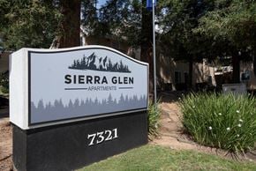 Citrus Heights apartment for rent - A sign for Sierra Glen Apartments is displayed in front of a building at Sierra Glen Apartments, California, 95621