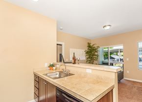 Oregon City townhouse for rent - A kitchen with a sink and a counter at The Landing Apartments and Townhomes, Oregon, 97045