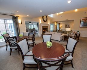 Menomonee Falls apartment for rent - A dining room with a wooden table and chairs.