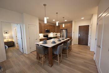 First-floor apartments with vinyl plank & tile throughout (bedrooms in townhomes and on upper floors are carpet)