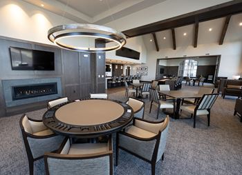 Club room with billiards, bar, poker, and shuffleboard
