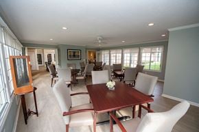 Appleton apartment for rent - A dining room with a wooden table and chairs.