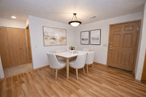 Menomonee Falls apartment for rent - A dining room with a table and chairs.