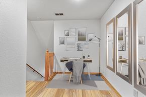 West Allis townhouse for rent - A dining room with a table and chairs.
