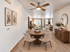 West Allis townhouse for rent - A dining room with a round table and chairs.