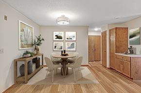 Waukesha apartment for rent - A dining room with a table set for four.