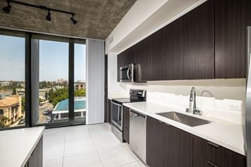 San Diego apartment for rent - A modern kitchen with a view of the city.