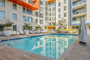 Los Angeles apartment for rent - a swimming pool in front of an apartment building