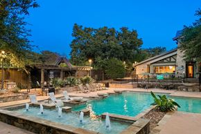 Denton apartment for rent - A backyard with a pool and a deck.