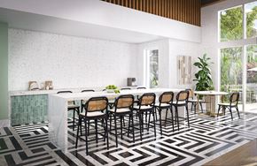 Orlando apartment for rent - A modern dining room with a long table and chairs.