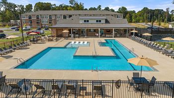 Resort style swimming pool with lap lane and sun deck