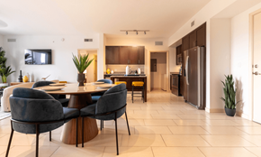 Pembroke Pines apartment for rent - A modern kitchen with a dining table and chairs.