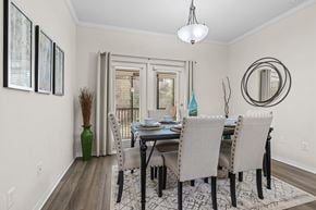 Jacksonville apartment for rent - A dining room with a table set for four.