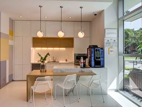 Boca Raton apartment for rent - A modern kitchen with a table and chairs.