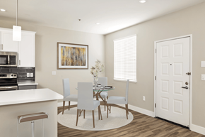 San Jose apartment for rent - A modern kitchen with a dining table and chairs.