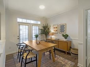 Alpharetta apartment for rent - a dining room with a table and chairs