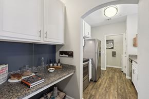 Annapolis apartment for rent - a kitchen with granite counter tops and a stainless steel refrigerator