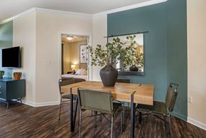 Ashburn apartment for rent - interior model dining area with table and seating