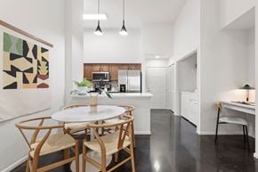 Tampa apartment for rent - A dining room with a white table and chairs.