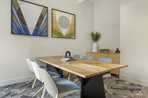 Richardson apartment for rent - a meeting room with two paintings on the wall