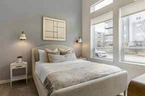 Richardson apartment for rent - a bedroom with a bed and two windows