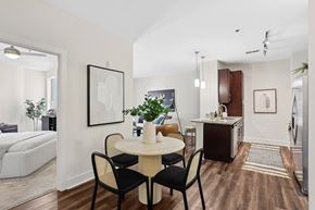 Atlanta apartment for rent - A dining room with a white table and chairs.