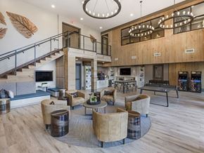 Raleigh apartment for rent - a clubhouse with a ping pong table and shuffleboard