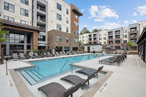 Raleigh apartment for rent - our apartments have a large swimming pool with lounge chairs