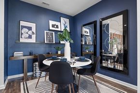 Mooresville apartment for rent - A dining room with a white table and chairs.