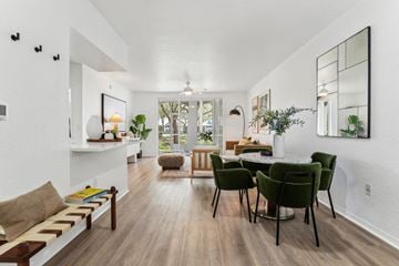 Palm Harbor apartment for rent - a living room and dining room with a table and chairs